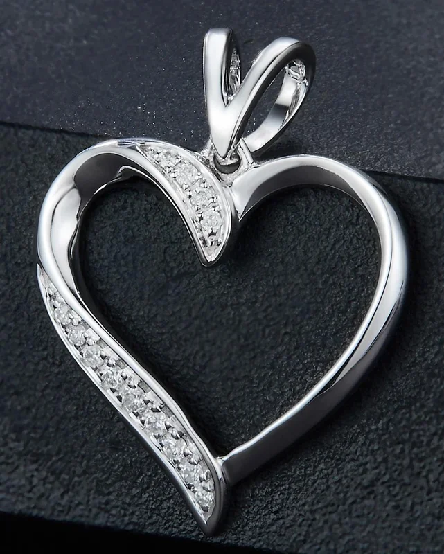 0.05 Ct. Diamond 10 Kt Gold (White). Heart Pendant. (Women).