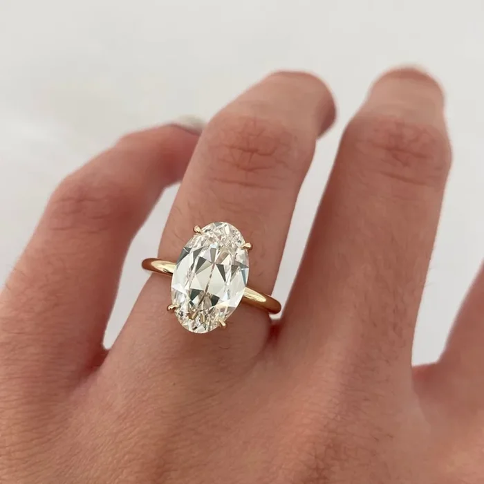 3.00 TCW Ethereal Oval Old Mine Cut Moissanite Diamond Solitaire Ring with Feather Slim Gold Prong Band
