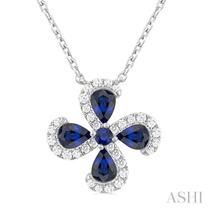 4×3 MM Pear Cut & 2 MM Round Cut Sapphire and 1/6 Ctw Round Cut Diamond Floral Shape Pendant With Chain in 14K White Gold