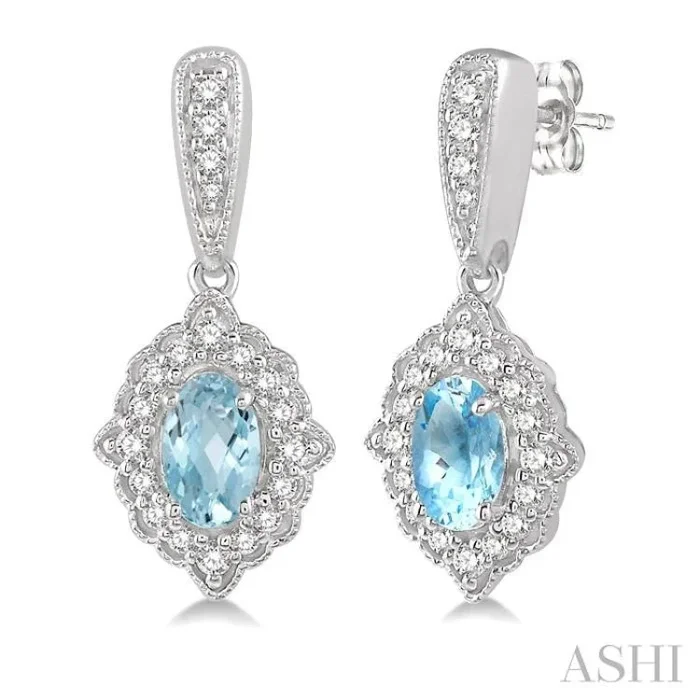 5×3 MM Oval Shape Aquamarine and 1/4 Ctw Round Cut Diamond Semi-Precious Earrings in 10K White Gold