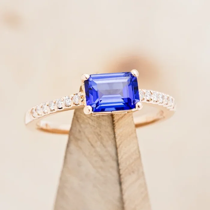 “AMARA” – EMERALD CUT ENGAGEMENT RING WITH DIAMOND ACCENTS