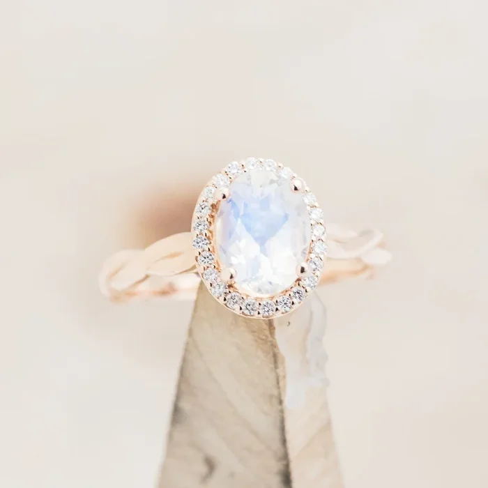 “EVERLEIGH” – OVAL CUT MOONSTONE ENGAGEMENT RING WITH DIAMOND HALO