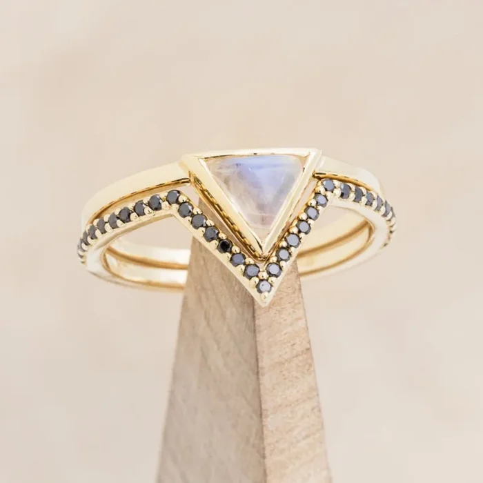 “JENNY” – TRIANGLE CABOCHON CUT MOONSTONE ENGAGEMENT RING WITH BLACK DIAMOND V-SHAPED TRACER