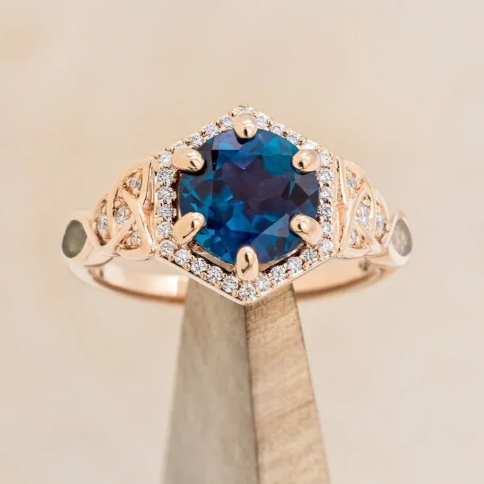 “LUCY IN THE SKY” – ROUND CUT ENGAGEMENT RING WITH A CELTIC KNOT DESIGN AND INLAYS
