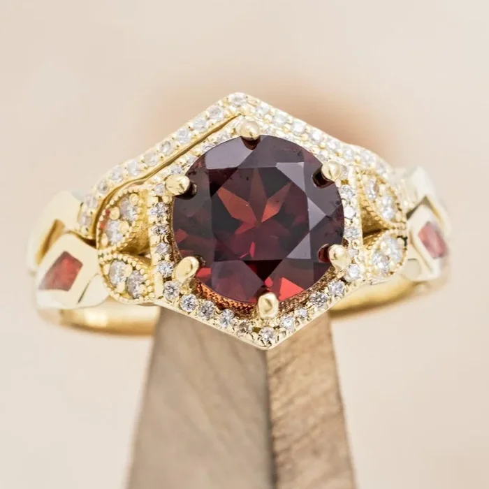 “LUCY IN THE SKY” – ROUND CUT GARNET ENGAGEMENT RING WITH DIAMOND ACCENTS, RED OPAL INLAYS AND A DIAMOND TRACER OR RING GUARD