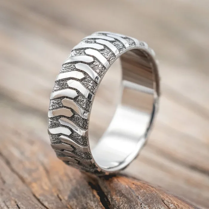 “PARCEL” – CUSTOM EMBOSSED TIRE TREAD WEDDING RING