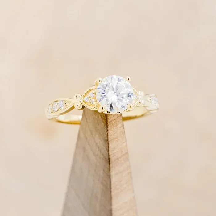 “VIVIANA” – ROUND CUT CENTER STONE ENGAGEMENT RING WITH DIAMOND ACCENTS