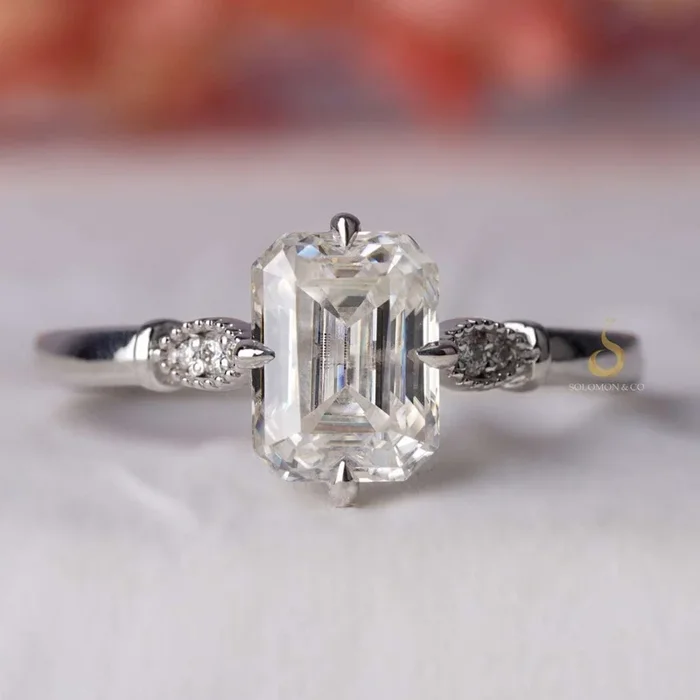 Compass Set Emerald Cut Engagement Ring