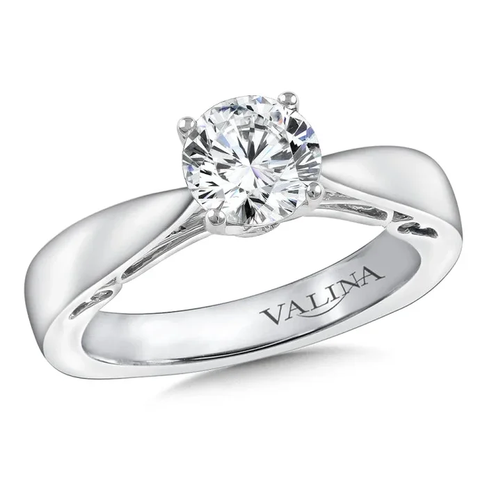Diamond solitaire engagement ring mounting in 14k white gold with diamond accented head.
