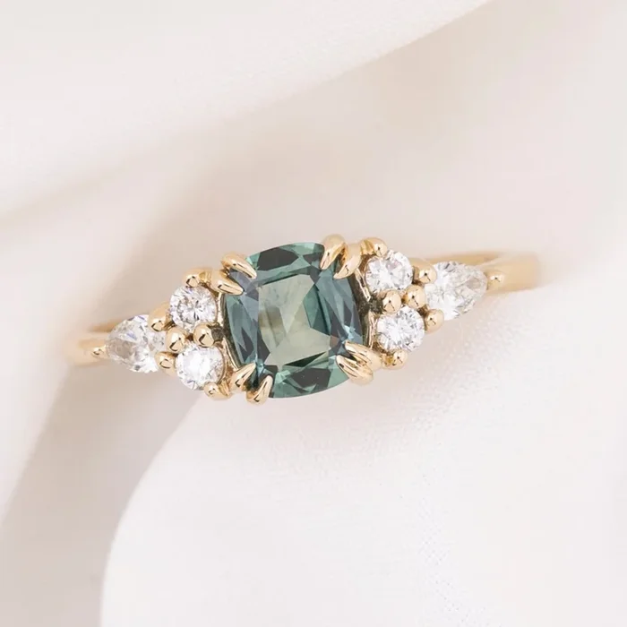 Remi Ring, 0.79ct Light Blue Green Montana Sapphire
