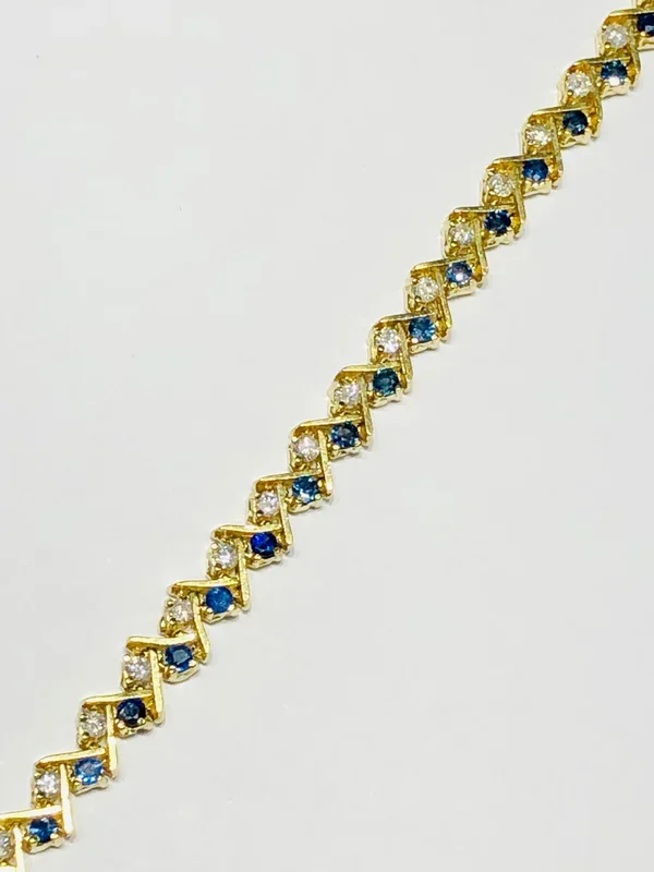 Round Sapphire and Diamond Bracelet (14K).