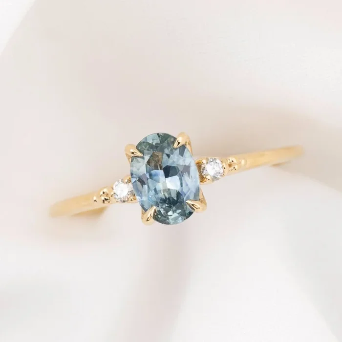 【一点物】エステルリング ・0.93ct・加熱モンタナ産ライトブルーサファイア・K14YG